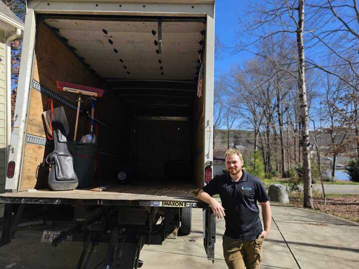 Junk Raider team loading junk into trucks in Gaston County, NC