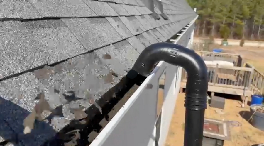 Professional gutter cleaning service in Charlotte, NC – Junk Raider team ensuring debris-free gutters for residential and commercial properties.