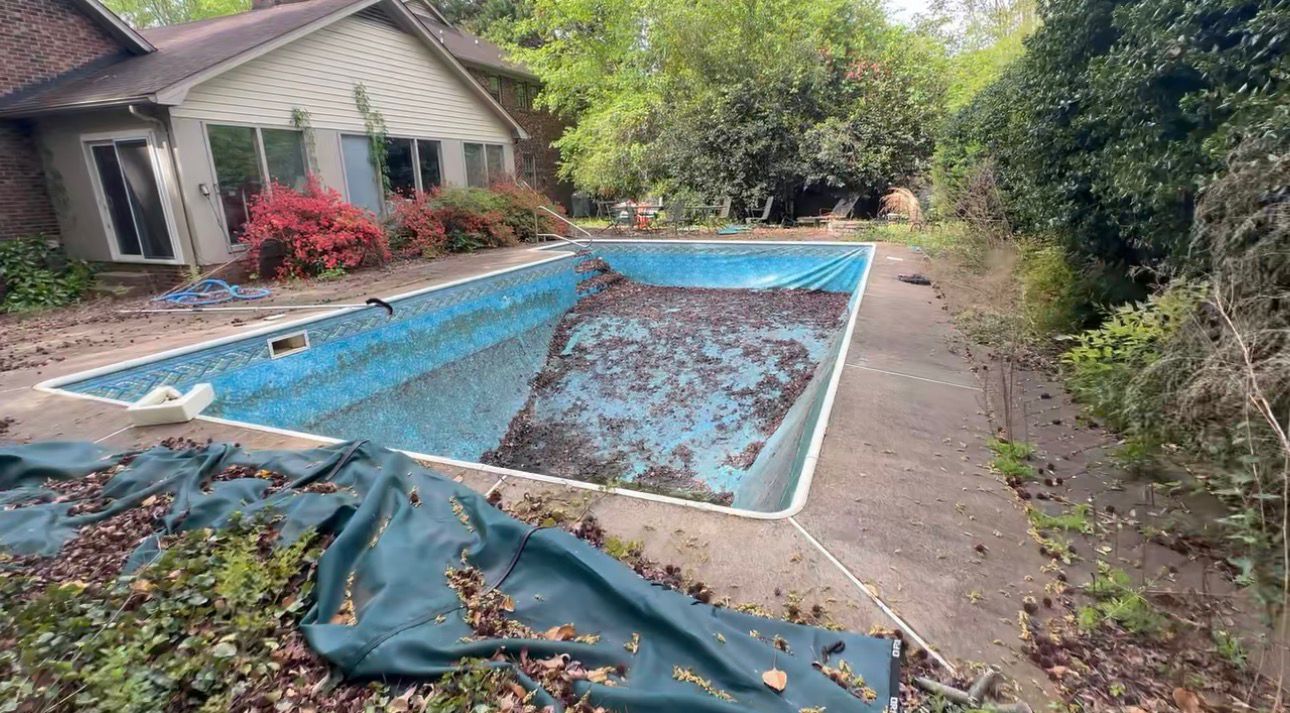 Derelict inground pool before removal by Junk Raider